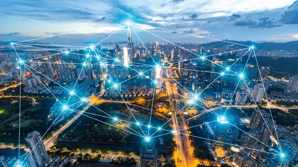 Photo of a cityscape with bright dots and connecting lines to represent the rapid dynamic development of digital banking in emerging markets.